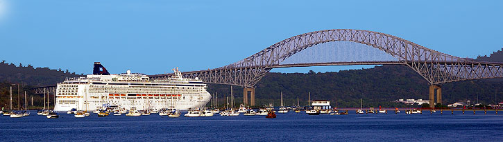 Cruise ship entering the Panama Canal from the Pacific at Panama City - Bridge of Las Americas