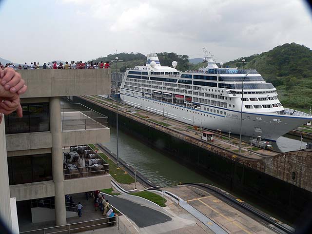 The Delphin Renaissance passes in front of the Miraflores Visitors Center