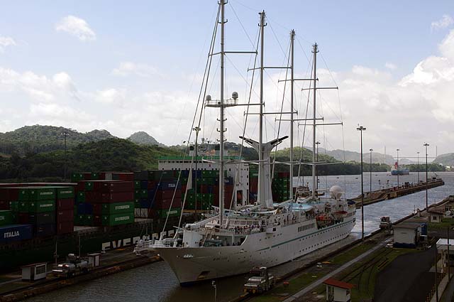 The msy Wind Star in the Panama Canal locks besides a container vessel